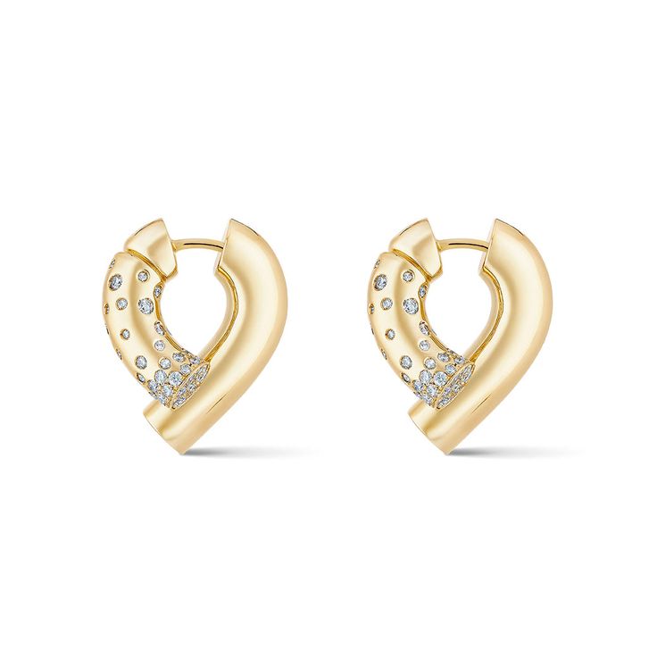 Experience the luxurious charm of TABAYER's Large Oera hoop earrings, crafted from Fairmined 18k yellow gold and adorned with pavé round brilliant diamonds. These statement hoops effortlessly combine bold design with ethical elegance. • Fairmined 18k yellow gold • 0.85tcw round brilliant diamonds (F-G color, VS clarity) • Drop: 0.75" Every TABAYER piece is handcrafted in Italy with meticulous care using 100% artisanal Fairmined gold and conflict-free diamonds, ensuring the smallest ecological footprint possible. Ecological Footprint, Bold Design, Brilliant Diamond, Conflict Free Diamonds, Pave Diamonds, Round Brilliant, Hoop Earrings, Diamonds, Yellow Gold