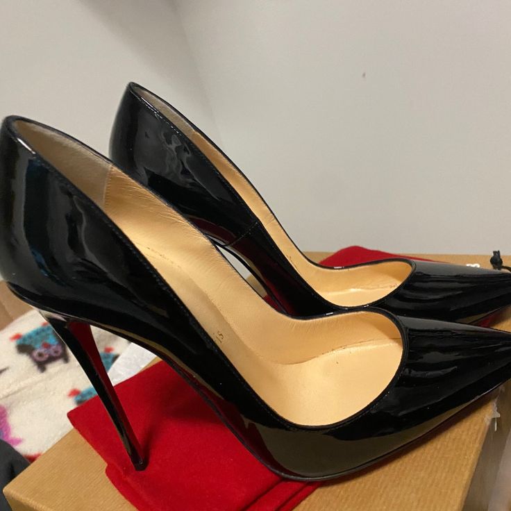 Christian Louboutin Black Patent Leather Heels With Leather Sole, Black Classic Patent Leather Heels, Black Patent Leather Heels With Red Sole, Luxury Black Pointed Toe Heels, Luxury Black Heels With Red Sole, Luxury Black Heels For Business, Luxury Black Business Heels, Designer Black Heels 4-inch Heel, Luxury Black Heels For Office