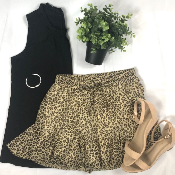 These Adorable Leopard Printed Ruffled Shorts With Elastic Waist And Drawstring Tie Pair Perfectly With A Black Sweater Or A Simple Tank. Fully Lined, Stretchy Waist And Decent Length. Fabric: 100% Polyester Chic Short Leopard Print Bottoms, Chic Leopard Print Short Bottoms, Chic Leopard Print Shorts, Leopard Print Shorts For Summer Vacation, Trendy Leopard Print Bottoms For Vacation, Summer Leopard Print Loungewear Bottoms, Leopard Print Bottoms For Summer Loungewear, Leopard Print Loungewear Bottoms For Summer, Chic Leopard Print Bottoms For Day Out