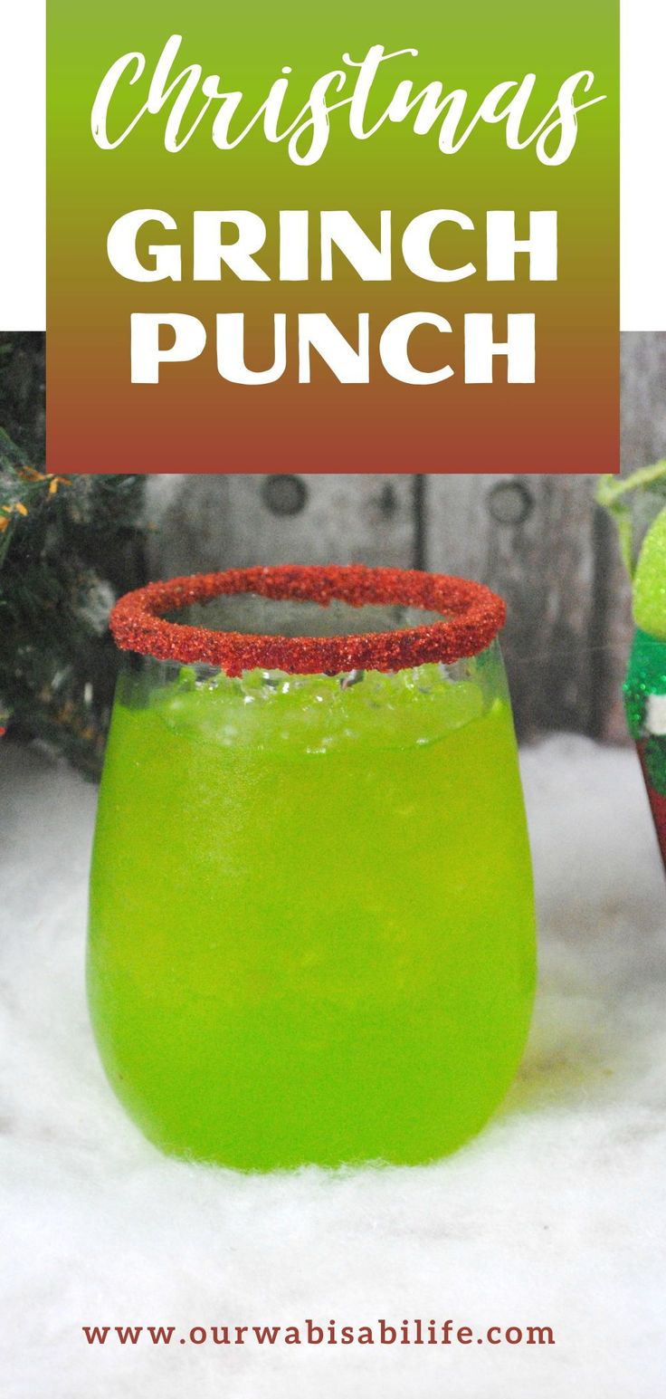 a green drink in a glass with the words christmas grin punch on it and an image of