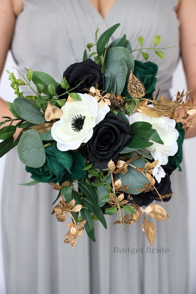 a bride holding a bouquet of flowers in her hands