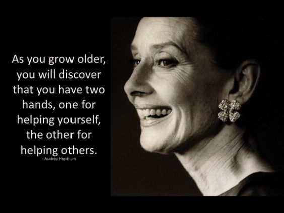 a black and white photo with the quote as you grow older, you will discovery that you have two hands, one for helping yourself, the other for helping others