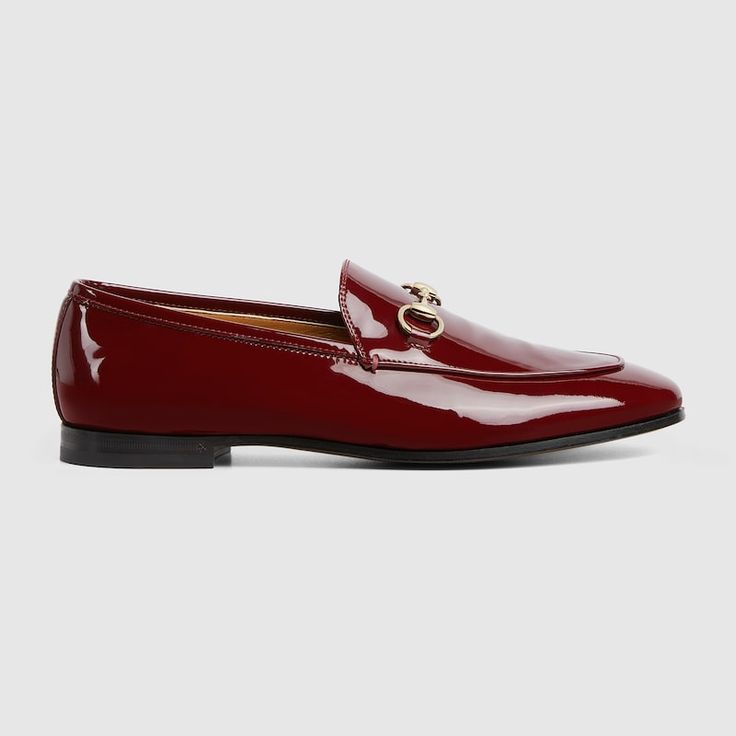 "Find GUCCI Jordaan Loafer Leather on Editorialist. The loafer with Horsebit, representative of Gucci heritage, speaks of classic elegance. This model is crafted in Gucci Rosso Ancora red patent leather and is defined by the iconic Horsebit. Gucci Rosso Ancora red patent leather, Women's, Light gold-toned hardware, Horsebit, Leather sole, Flat, 0.5\" heel, Made in Italy" Luxury Patent Leather Loafers With Goodyear Welted, Classic Business Loafers With Red Sole, Luxury Loafers With Red Sole For Work, Classic Loafers With Red Sole For Business, Luxury Loafers With Red Sole For Business, Luxury Business Loafers With Red Sole, Classic Loafers With Red Sole For Office, Timeless Gucci Loafers With Leather Sole, Gucci Timeless Leather Sole Loafers