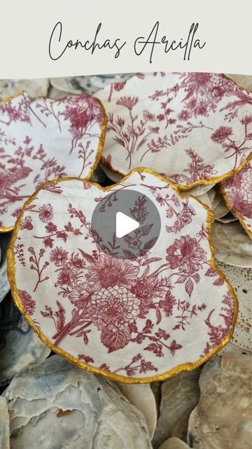 some red and white plates with flowers on them