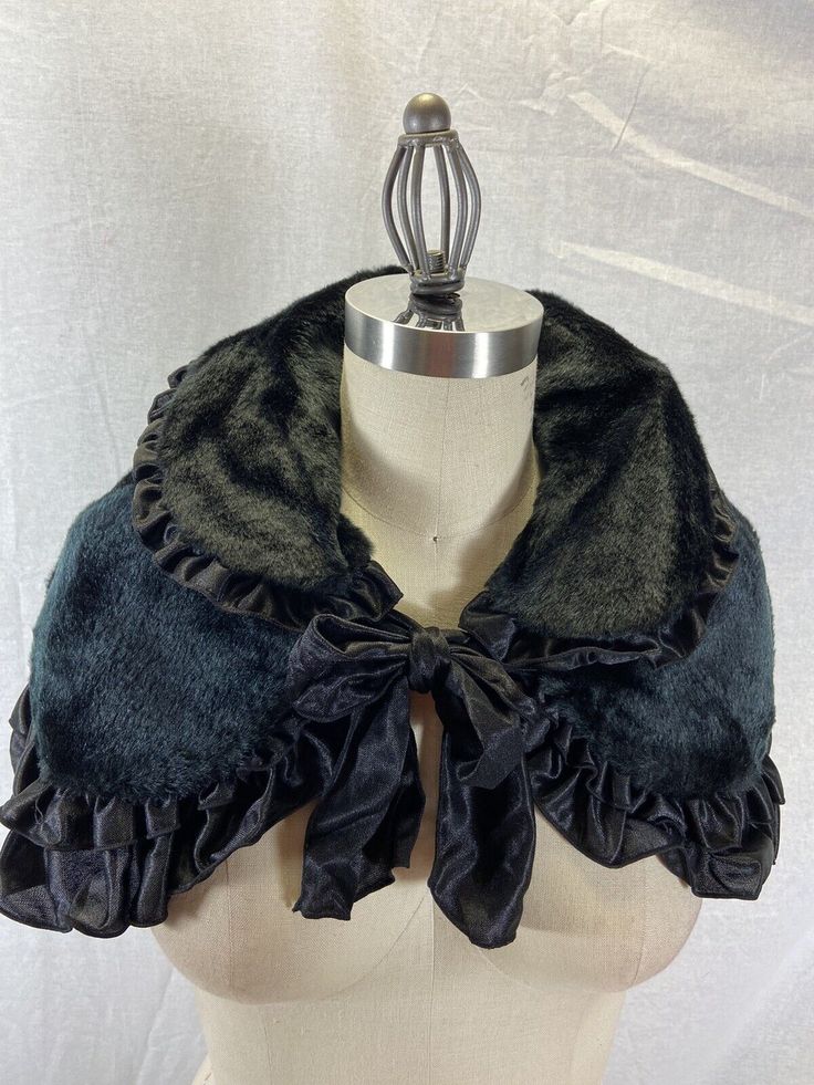 A black 10" faux fur ruffled capelet with satin tiny trim ruffles. Was $25.99 now $18.00 as we are retiring and closing. Akron Design & Costume. Vintage Ruffled Winter Outerwear, Vintage Capelet For Winter, Vintage Winter Capelet, Lace Inspiration, Random Clothes, Couture Embroidery, Nice Clothes, Leg Avenue, Costume Design