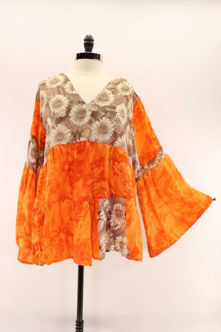 Billowy and romantic, this buttery soft blouse features a v-neckline and bell sleeves. Made from vintage rasgulla silk saris. Available in 3 sizes* S 6-10 M 12-14 L 16-18 Approximately 30” long *Tags were updated with new size designations. Blouse measurements did not change. Some tags will reflect the previous sizing designations. Tag changes are as follows… S/M to S L/XL to M XXL to L Care Instructions: Hand wash and line dry for longest life. Disclaimer: The material used in this style is rep Butterfly Blouse, Blouse Measurement, Bell Sleeves, Im Not Perfect, Silk, Fabric