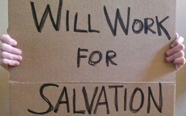 a person holding a cardboard sign that says will work for salvation on the front and back