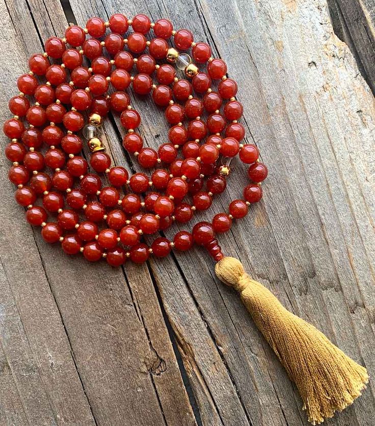 About this Mala: 8mm Carnelian+ Citrine Mala with carnelian beads, citrine and 14k gold plated markers, finished with a carnelian guru bead and “knotted: with golden spacers. Red 8mm Beads Jewelry For Meditation, Gold Mala With Round Beads For Healing, Spiritual Carnelian Round Beads Jewelry, Spiritual Carnelian Jewelry With Round Beads, Gold Healing Mala With 108 Beads, Gold Mala With 108 Beads For Healing, Spiritual Carnelian 8mm Beaded Jewelry, Spiritual Carnelian Beads Jewelry 8mm, Spiritual Carnelian 8mm Bead Jewelry