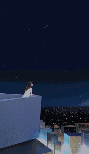 a woman sitting on top of a building looking at the moon in the night sky