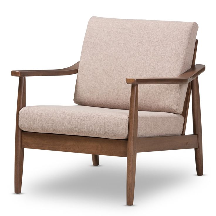 a wooden chair with beige upholstered fabric on the armrests and back