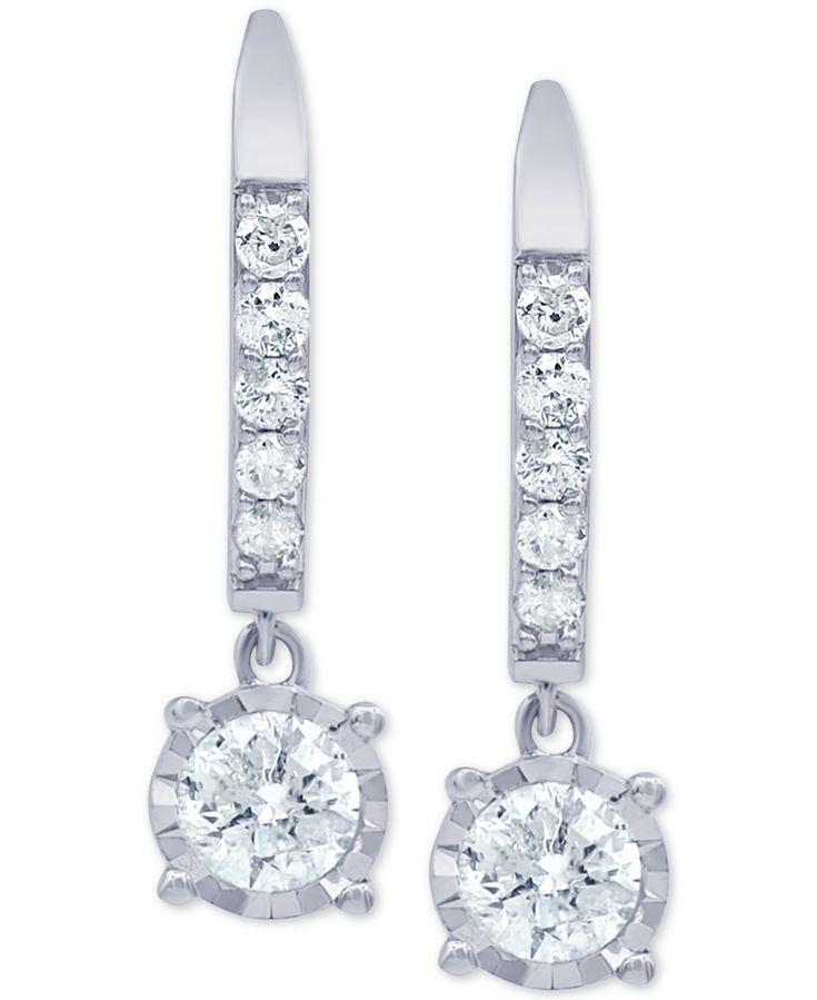 The classic beauty of round-cut diamonds is modernized in these glamorous leverback white gold earrings. Classic Round Diamond Earrings From Macy's, Macy's Classic Brilliant Cut Diamond Earrings, Macy's Classic Diamond Earrings With Diamond Accents, Macy's Classic Diamond Earrings With Accents, Macy's Round Cut Diamond Earrings, Classic White Platinum Hoop Earrings, Macy's Round Diamond Earrings With Prong Setting, Classic Platinum Dangle Jewelry, Macy's Diamond Earrings With Prong Setting