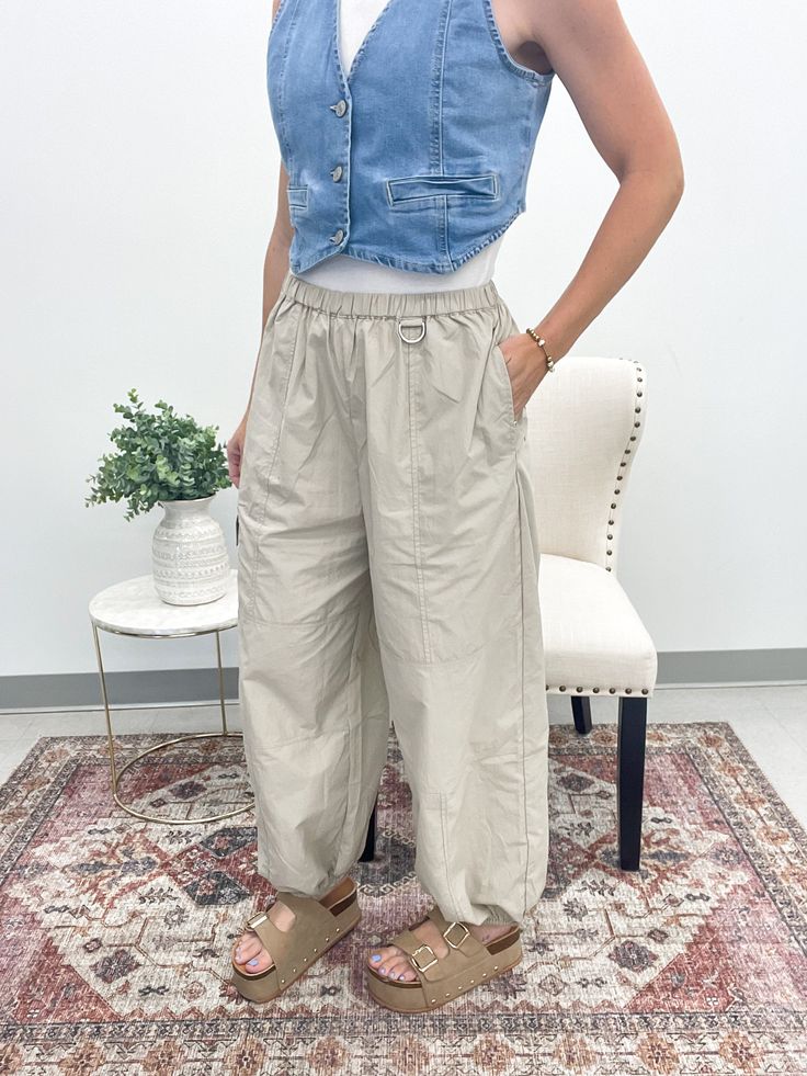 Introducing our Big Dreams Parachute Cargo Pants in Tan! These balloon cargo pants feature side slit pockets, an elastic waist, and elastic ankle cuffs for a comfortable fit. Live life a little more freely with these unique and playful pants. True to size 100% Nylon Model is 5’4 and wearing a small Parachute Cargo Pants, Parachute Cargo, Mobile Boutique, Big Dreams, Ankle Cuffs, Gift Boutique, British Indian, Dress Romper, Dream Big