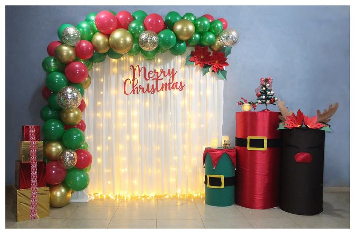 a christmas themed backdrop with presents and balloons