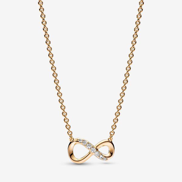 Celebrate your love to infinity and beyond with the Sparkling Infinity Collier necklace. Featuring a fixed infinity symbol pendant, this 14k gold-plated piece symbolises the power of unbreakable bonds and serves as a reminder of the love you share with those that matter most to you. The symbol features stones along the top line of the motif as well as a sliding clasp, so you can adjust your collier necklace's length. Wear it as a way of showing your appreciation for a loved one or gift it to som Pandora Gold, Pandora Necklace, Bracelet Pandora, Minimal Necklace, Infinity Necklace, Jewellery Uk, Everyday Necklace, Pandora Jewelry, Free Jewelry