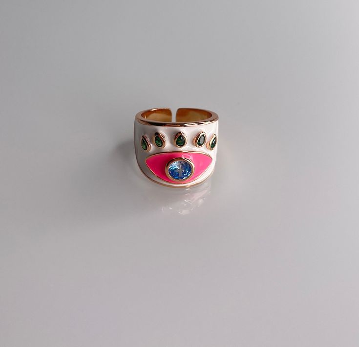 Gorgeous enamel Ring! This ring is more than a fashion statement, it is also a beautiful piece of artwork! Grab yours today! Specifications: . Enamel - Turquoise and Blue Evil Eye Ring . Adjustable Trendy Pink Enamel Ring For Gift, Trendy Pink Enamel Ring As Gift, Pink Enamel Rings For Gift, Adjustable Pink Enamel Rings, Trendy Open Enamel Ring For Gift, Trendy Open Enamel Ring As Gift, Trendy Enamel Ring As A Gift, Trendy Enamel Round Rings, Unique Hand Painted Enamel Rings