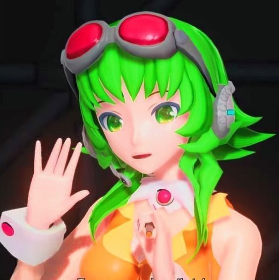 a woman with green hair wearing headphones and holding her hand up in front of her face