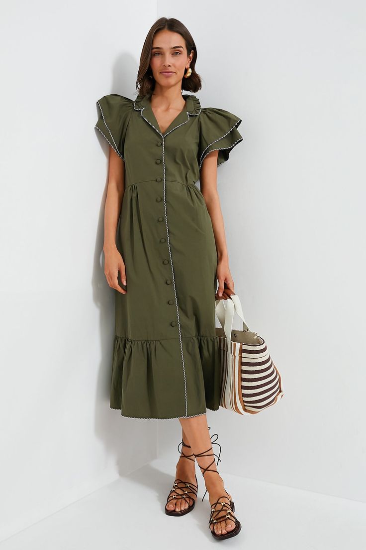 The Olive Green Alice Dress is an elevated midi that can seamlessly take you from day to night. Feminine details that we love include the short ruffle sleeves, the mini scalloped hem, and the ruffle hem that adds a hint of volume. Pair with ballet flats and pearls for daytime activities, or with black heels and a clutch for date night. Collared V-neckline Short ruffle sleeves Front button placket Cinched waist seam Side pockets Ruffle hem Mini scalloped contrast border Midi length Material: 100% Alice Dress, Designed Shoes, Feminine Details, Cocktail Attire, Denim Skirts, Loeffler Randall, Shopping Day, Weekend Wear, Ruffle Sleeves