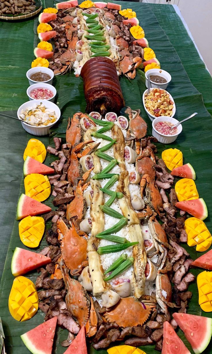 a long table topped with lots of food