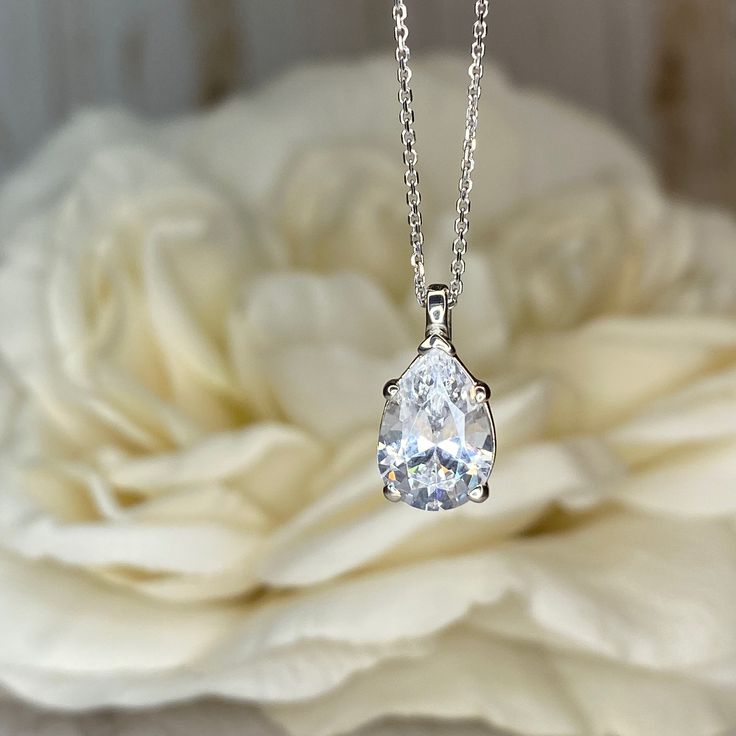 2ctw Pear Pendant 14k Gold Necklace, Moissanite Pendant, Solitaire Ladies Necklace, Tear Shape Pendant , #7070 #WeddingGift #GiftIdeasForHer #GiftForHer #PearShape #EngagementGift #BridalGift #SimulatedDiamond #14kGold #GraduationGift #AnniversaryRing Formal Pear-shaped Diamond Cut Drop Necklace, Classic Pear-shaped Diamond Drop Necklace, Classic Pear Shaped Diamond Drop Necklace, Formal Teardrop Drop Necklace With Diamond Cut, Pear-shaped Brilliant Cut Drop Necklace For Wedding, Formal Pear-shaped Solitaire Necklace, Diamond White Teardrop Pendant Drop Necklace For Formal Events, Formal Diamond White Teardrop Pendant Drop Necklace, Diamond White Teardrop Pendant Drop Necklace For Formal Occasions