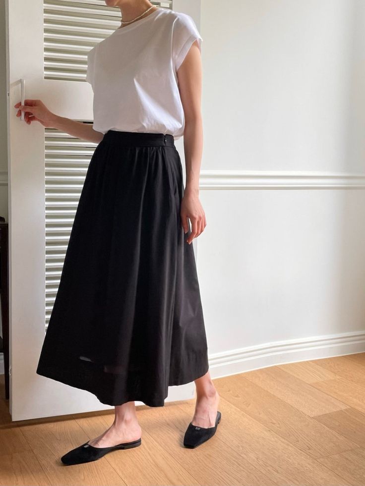 Luxe cotton skirt made from 100% cotton. Midi length, voluminous skirt. Model is in MINUSEY ONE SIZE. ✔️ Free worldwide express shipping over $100✔️ Loved by 6,500+ customers✔️ Limited edition collections, maximum style⠀⠀⠀⠀⠀⠀⠀⠀⠀Stay ahead of the trend with can’t-find-anywhere-else staples. Your closet will thank you 💕 * MINUSEY ONE SIZE = EU 34 -38, US 2-6* 100% Cotton* Dry clean* Made in Korea - Model Height: 172cm/5'7" (US2, EU34) Black Relaxed Fit Maxi Skirt For Daywear, Black Flowy Maxi Skirt For Daywear, Black Tiered Skirt For Daywear, Black Voluminous Cotton Maxi Skirt, Black Cotton Midi Pleated Skirt, Black Cotton Pleated Midi Skirt, Black Cotton Pleated Maxi Skirt, Black Long Skirt For Daywear, Cotton Voluminous Maxi Skirt For Work