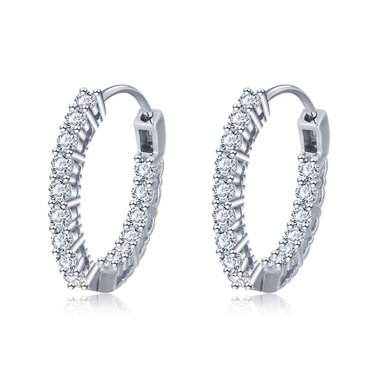 Dainty and dazzling, these hoop earrings lend a touch of sparkle to your look. Crafted in sterling silver, these earrings are available in three plating colors. The hoop earrings are a classic versatile choice for every woman. Carat Weight: 1.82 ctStone Size: 2 mmStone Type: Jeulia® StoneNumber of Stones: 28 Stone Color: Diamond WhiteStone Shape: RoundWeight: 1.97 gWidth: 2.34 mmHeight: 3.2 mmThickness: 2.35 mmMaterial: 925 SilverPlating Color: Silver Jeulia Jewelry, Small Silver Hoop Earrings, Cubic Zirconia Hoop Earrings, Sterling Silver Rings Set, Silver Ring Set, Sterling Silver Hoop Earrings, Sterling Silver Hoops, Online Earrings, White Sapphire