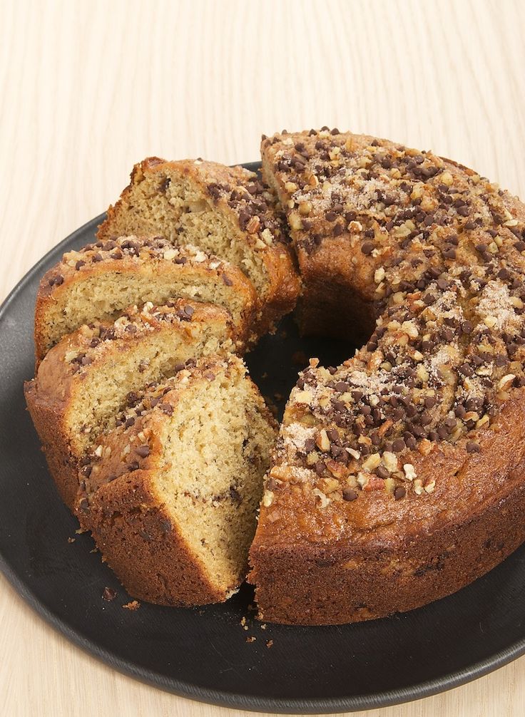 a cake that has been cut into slices on a plate with one slice taken out