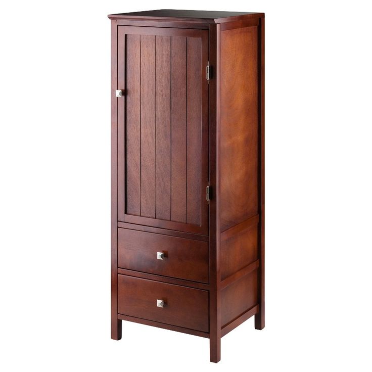 an armoire with two drawers and one door on the bottom, in dark wood