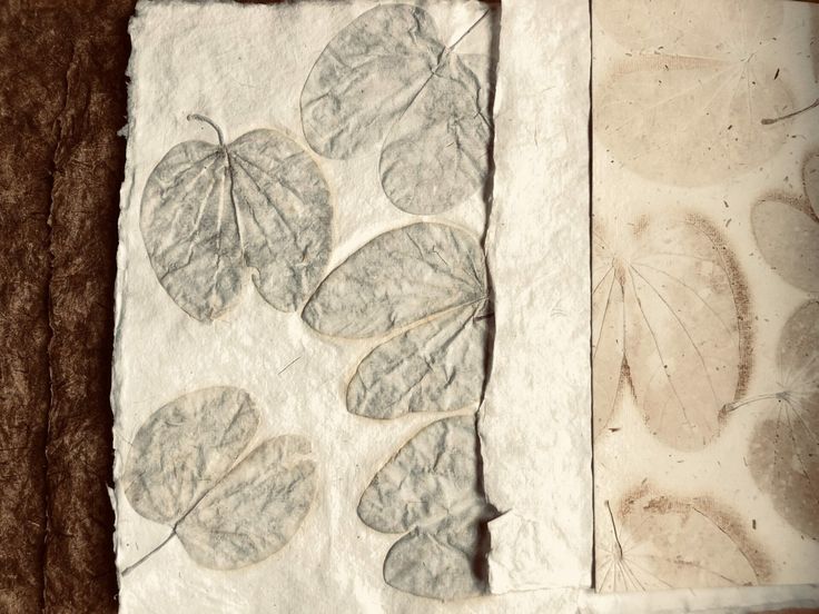 three leaf prints are shown on the fabric