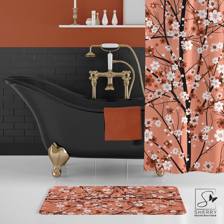 a bathroom with an orange shower curtain and black bathtub next to a white sink