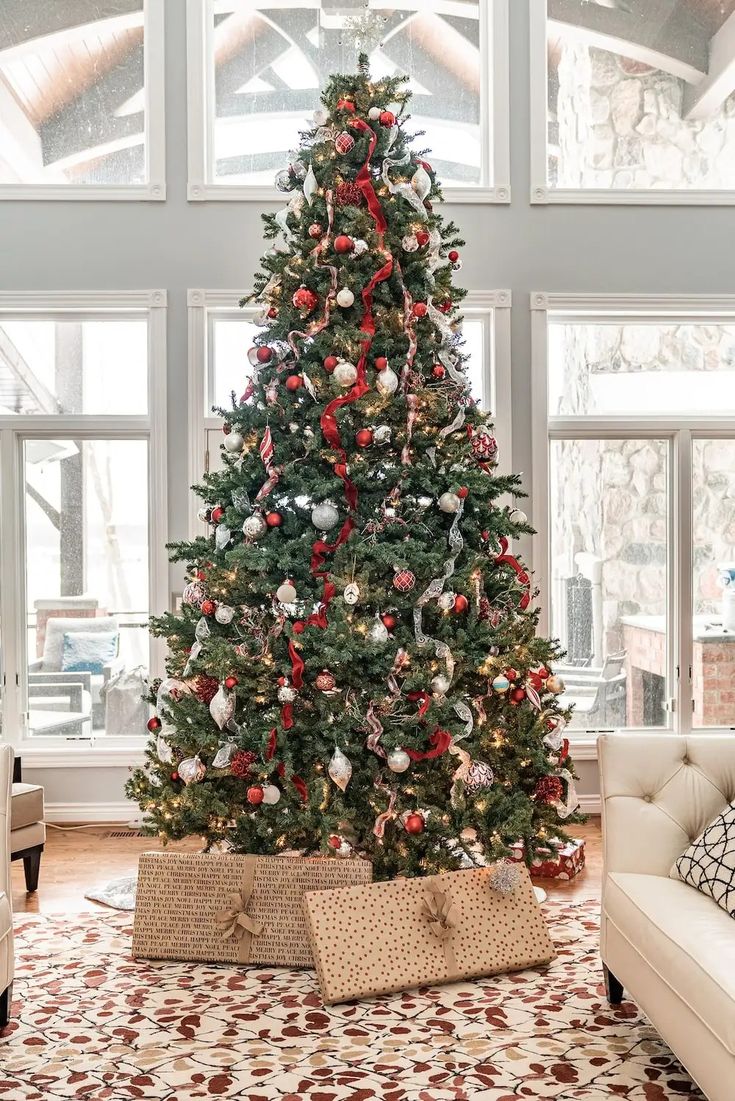 a decorated christmas tree in a living room