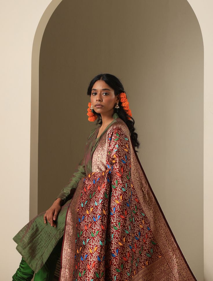 Introducing the Chidiya Banarasi Silk Collection, a celebration of elegance and tradition in the world of Indian textiles. Crafted with meticulous attention to detail, each piece in this collection showcases the timeless beauty of Banarasi silk adorned with intricate Chidiya (bird) motifs. Drawing inspiration from nature's grace, the Chidiya Banarasi Silk Collection offers a stunning array of sarees, dupattas, and garments, reflecting the rich heritage of Varanasi's weaving tradition. Immerse yo Traditional Jamawar Anarkali Set With Dupatta, Chanderi Pashmina Shawl With Zari Weaving For Weddings, Ceremonial Raw Silk Salwar Kameez With Dupatta, Raw Silk Salwar Kameez With Dupatta For Traditional Ceremonies, Diwali Chanderi Traditional Wear With Meenakari, Traditional Salwar Kameez With Traditional Patterns For Festive Occasions, Festive Art Silk Traditional Wear With Patterns, Festive Traditional Wear With Art Silk Patterns, Art Silk Pashmina Shawl In Traditional Drape