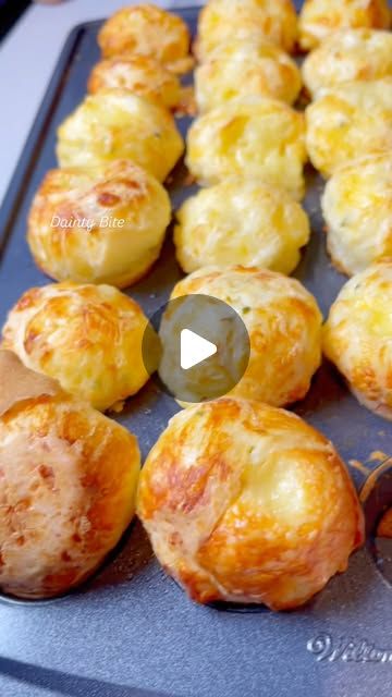 some food that is on a pan and being prepared to be cooked in the oven