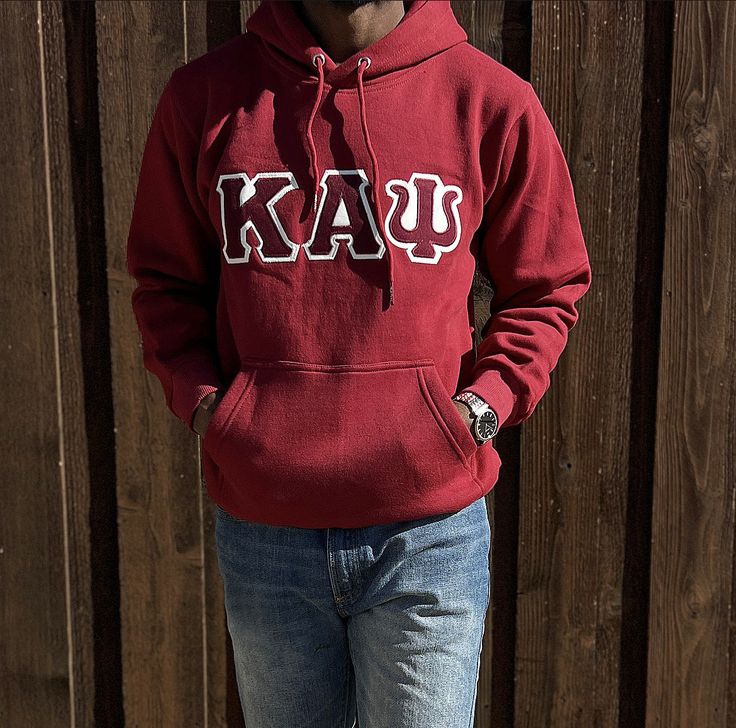 Exclusive Kappa Alpha Psi Double Stitched Appliqué Embroidery Lettered Hoodie. This is the perfect long-sleeved hoodie to wear while showing off your Kappa Alpha Psi fraternity lettering. A comfortable 100% cotton tee with a twill Greek letters embroidery across the chest give you the perfect fit. This hoodie is also a perfect gift for your favorite Kappa Man. Fast Shipping & Processing: 1-2 days to process US Domestic Shipping: 3-5 business days International Shipping: 7-14 business Collegiate Cotton Sweatshirt With Kangaroo Pocket, Varsity Hoodie With Embroidered Logo And Long Sleeves, Varsity Long Sleeve Hoodie For College, Collegiate Long Sleeve Fleece Hoodie, Varsity Hoodie For College In Fall, College Hoodie With Long Sleeves And Kangaroo Pocket, Collegiate Hoodie For College In Fall, Collegiate Sweatshirt With Double-lined Hood, College Long Sleeve Hoodie With Kangaroo Pocket