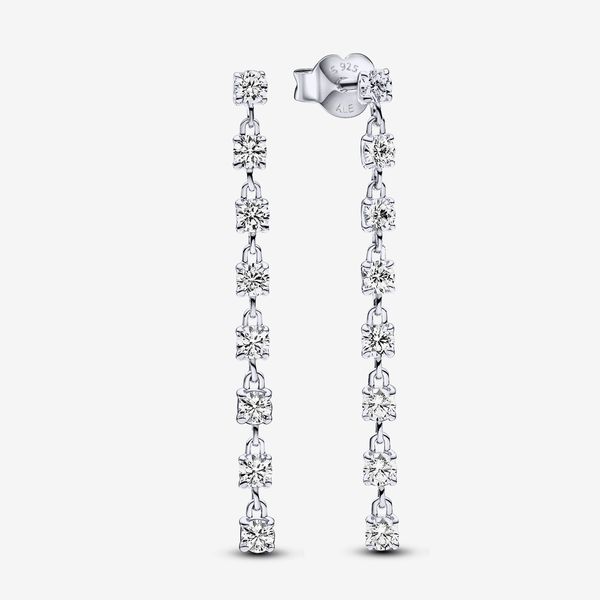 Frame your face with our Sparkling Eight Stones Drop Earrings. Crafted in sterling silver, these earrings feature a row of 8 clear cubic zirconia stones, elegantly dangling in pairs. The unique design allows for versatile styling, while heart-shaped butterfly backs ensure a secure fit. Express yourself with this delicate, sparkling pair — perfect for adding a touch of glamour to any occasion. Sold as a pair, these sterling silver drop earrings are a staple for your jewellery collection. - Pandor Droplet Earrings, Sterling Silver Drop Earrings, Silver Drop Earrings, Jewellery Collection, Lab Created Diamonds, Sterling Silber, Sterling Silver Earrings, Lab Grown Diamonds, Cubic Zirconia