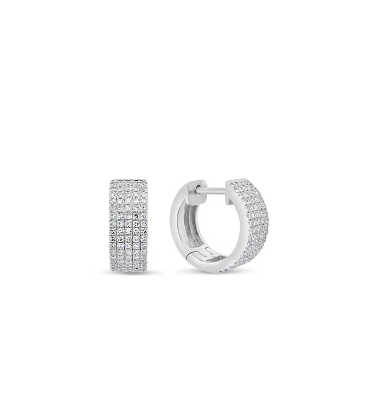 Luxuriate in the glamour of our 14k gold Diamond 5 Row Huggie Earring; featuring an exquisite pave diamond design set in a huggie earring for a truly dazzling look. Our Diamond 5 Row Huggie Earring is the perfect accessory to take any ensemble to the next level of luxury. Huggie Earring, Diamond Design, Design Set, Huggies Earrings, Set Design, Pave Diamonds, Next Level, Gold Diamond, The Row