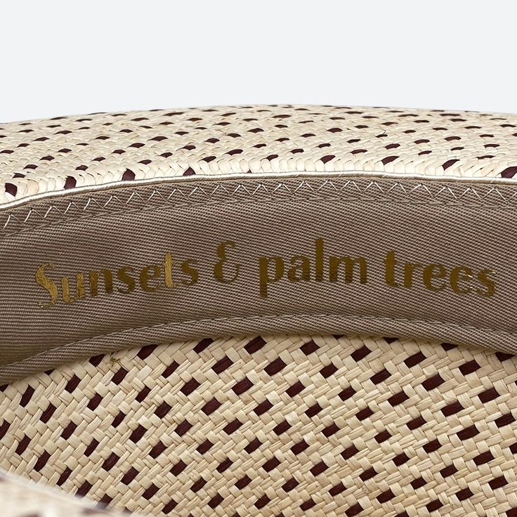 Silk and cotton ribbons with small details around crown Sweatband with 'Sunsets & palm trees' inspirational quote All hats are unique and have perfect imperfections! Straw hat hand woven in Ecuador Hand made and designed by Valeria in California Luxury Wide Brim Fedora For The Beach, Luxury Wide Brim Fedora For Beach, Luxury Straw Hat With Short Brim For Beach, Luxury Fedora Straw Hat For Summer, Luxury Fedora Straw Hat For The Beach, Luxury Fedora Straw Hat For Beach, Luxury Short Brim Straw Hat For The Beach, Luxury Curved Brim Fedora For The Beach, Luxury Short Brim Straw Hat For Beach