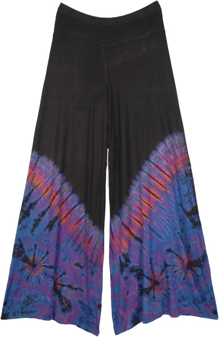 These loose and broad leg pants in black look very elegant and can be worn with a wide variety of tops. A very comfortable pair of pants with a beautiful tie and dye print at the lower part of it; below the knees. #tlb #SplitSkirtsPants #XLPlus #Misses #Yoga #vacationclothing #beachwrap #TieDye #Tiedyepalazzopants #widelegpants #festivalbohopants Black Relaxed Fit Wide-leg Yoga Pants, Versatile Black Wide Leg Harem Pants, Black Wide Leg Pants For Summer, Black Stretch Wide-leg Yoga Pants, Black Stretch Bohemian Bottoms, Bohemian Black Stretch Bottoms, Black Loose Fit Wide Leg Harem Pants, Black Bohemian Wide Leg Pants, Black Bohemian Straight Pants