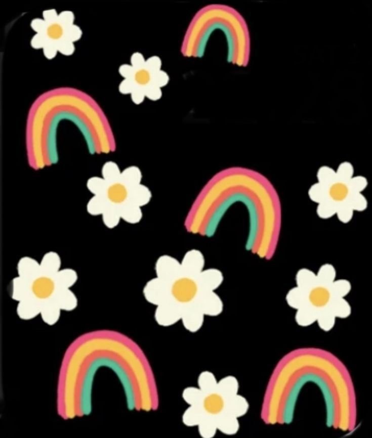 a black tray with white flowers and rainbows on the side, in front of a black background