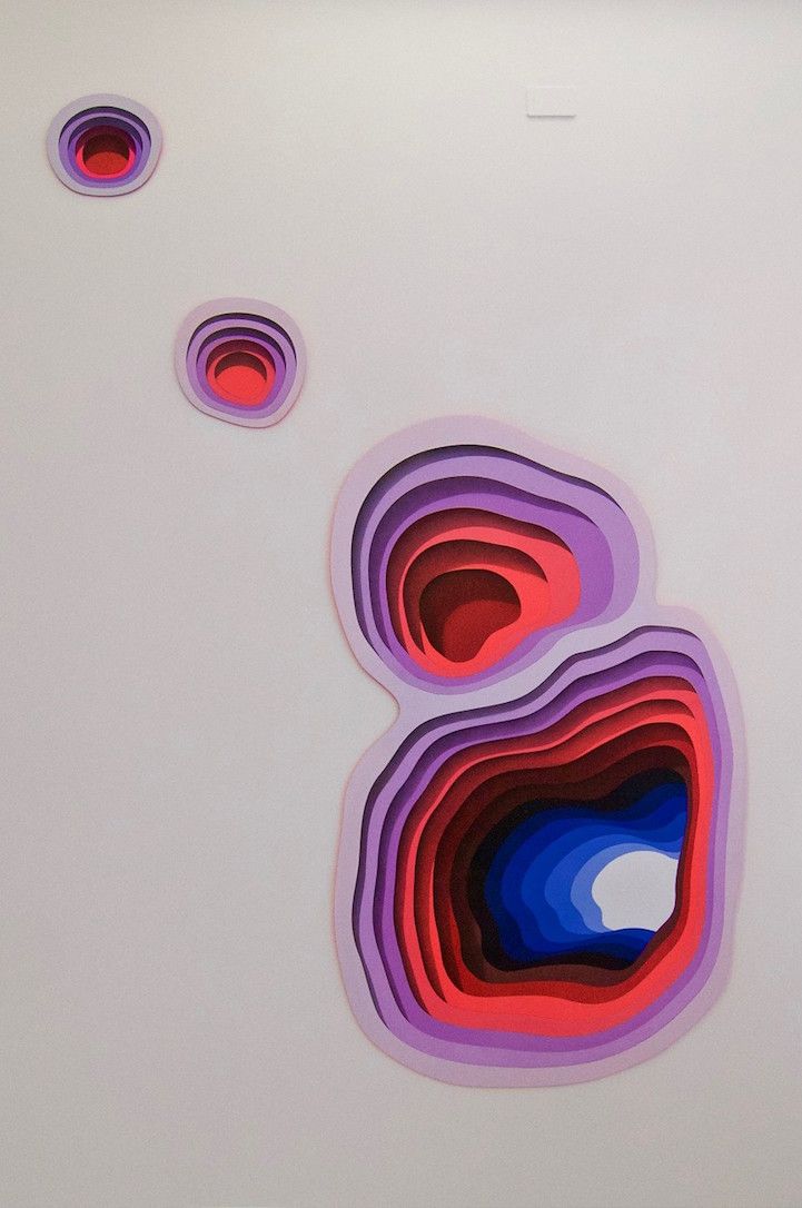 an abstract painting with three circles in the middle