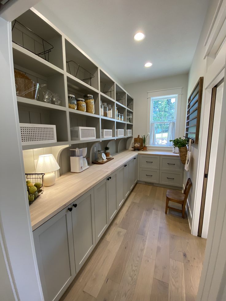 the kitchen is clean and ready to be used for cooking or baking, as well as other things