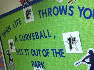 a bulletin board with stickers on it that says throw you a curveball, hit out of the park