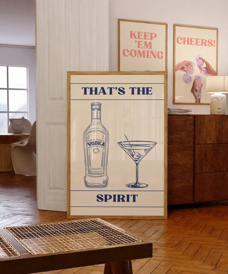 🍸 Elevate your spirits with our 'That's the Spirit' Vodka Poster! 🌟 This stunning navy blue print exudes a retro and fancy vibe with its chic design. Featuring a simply drawn vodka bottle and martini glass, it's the perfect addition to your bar cart, apartment, or any space in need of a touch of sophistication. 🏡🍹 Let the good times flow and the celebrations begin! Order now and toast to style with this timeless piece of art. Liquor Poster, Alcohol Poster, Bar Cart Wall, College House, Bar Cart Art, Bar Art, Apartment Decor Inspiration, Trendy Kitchen, City Apartment