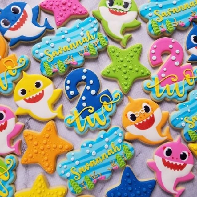 some decorated cookies that are on a table