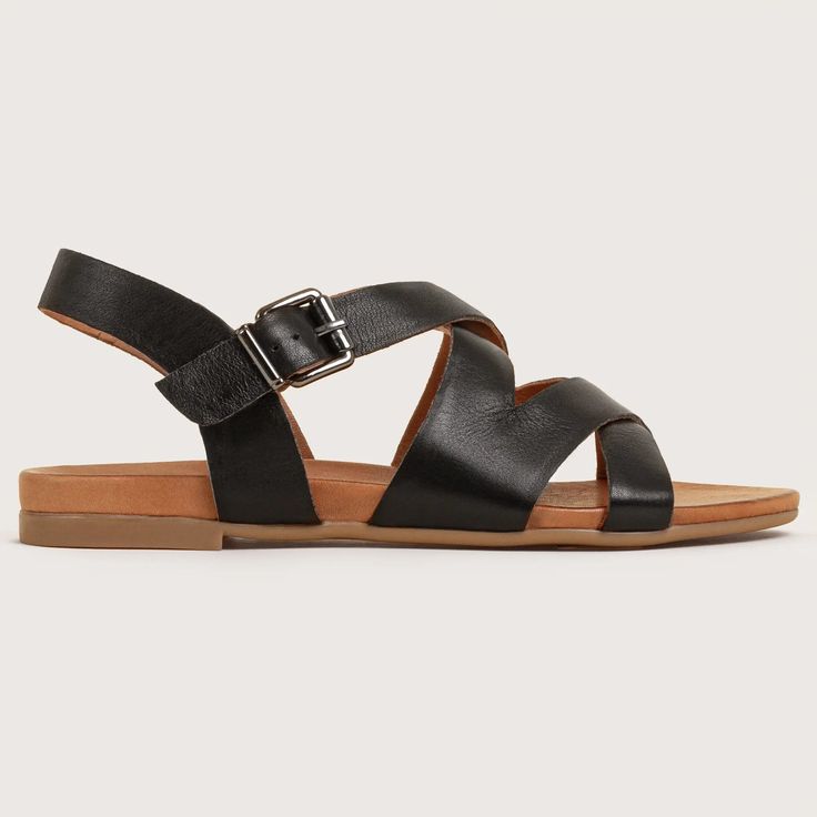 Rock - Black Chic Strappy T-strap Sandals With Adjustable Strap, Adjustable Cross-tied Strappy Sandals, Chic Sandals With Crisscross Straps And Open Toe, Chic Cross Strap Sandals For Vacation, Adjustable Cross-tied Open Toe Sandals, Spring Leather Toe Ring Strappy Sandals, Leather Strappy Toe Ring Sandals For Spring, Vacation Cross Strap Wedge Sandals, Chic Strappy Sandals With Adjustable Strap