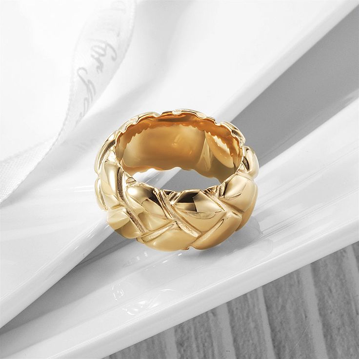 Sku: NSR150STGC Details: Perfect to wear alone or stacked, the chunky ring is always outsize and is about to be all the rage. With an original design, a handcrafted feel, and a polished gold layer, this gold twist ring spells fabulous and edgy. A classic style of braided texture adds just the right amount of accent to your band of the gold statement. Our beautiful pieces are made of a metal that is hypo-allergenic which is great for those with sensitive skin. Our pieces will not discolor, tarnis Gold Twist Ring, Retro Band, Middle Finger Ring, Chunky Ring, Braided Ring, Gold Statement Ring, Ring Stack, Textured Ring, Chunky Rings