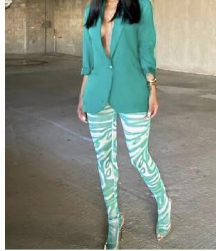 Make your wardrobe pop with this luxe blazer. Its a green material with an oversized fit and one button detailing. style this blazer with matching leggings and heels or boots for a look that is sure to get noticed this season. Model is wearing Large for the blazer and small for the leggings Please Note: due to the difference in lighting the items might look different Leggings And Heels, Green Blazer, Matching Leggings, Clothes Closet, Green Material, Trending Dresses, Fashion Killa, Top Trends, Black Leggings