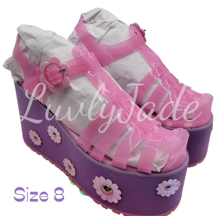 Daisies Jelly Platform Sandals Iridescent Womens | Purple & Pink | Size 8 | New Daisies Jelly Platform Sandals With A Foam Wedge Sole, A Clear Jelly Synthetic Upper Eva Sole Design And Iridescent Daisy Flowers All Over. Pvc Sandals With Round Toe For Summer, Pink Platform Jelly Sandals With Open Toe, Pink Platform Open Toe Jelly Sandals, Pink Open Toe Platform Jelly Sandals, Spring Platform Closed Toe Jelly Sandals, Iridescent Round Toe Synthetic Heels, Iridescent Synthetic Heels With Round Toe, Iridescent Synthetic Round Toe Heels, Spring Open Toe Pvc Heels