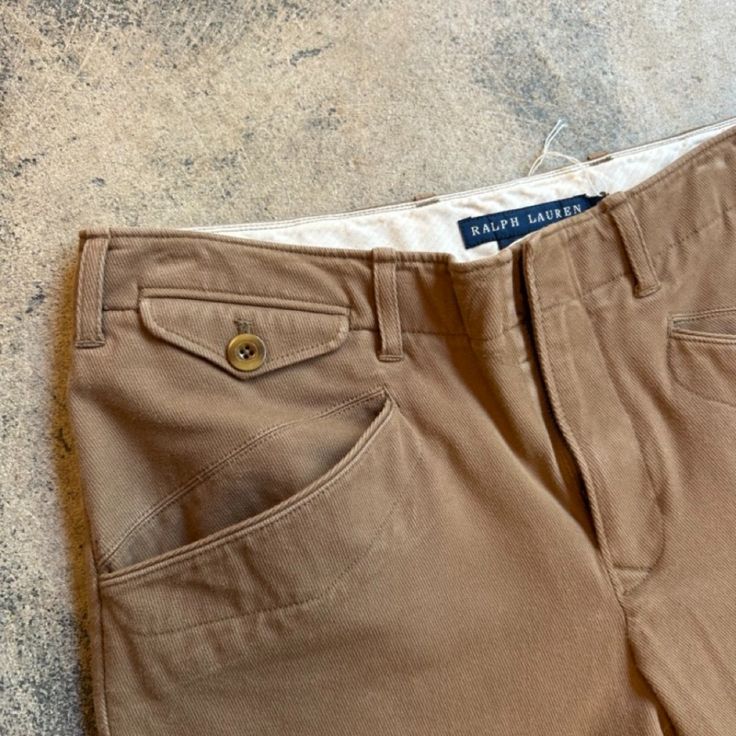 Ralph Lauren Brown Vintage Riding Pants, Side Button Detail Size 6 Length 34'' Waist 30'' #Ralphlauren #Designer #Ridingpants Classic Brown Bottoms With Hip Pockets, Fitted Brown Chinos With Pockets, Classic Brown Chinos With Pockets, Classic Brown Bottoms With Patch Pockets, Classic Brown Chinos With Belt Loops, Classic Brown Pants With Button Closure, Classic Brown Cotton Cargo Pants, Fitted Beige Cargo Pants With Belt Loops, Fitted Brown Bottoms With Patch Pockets