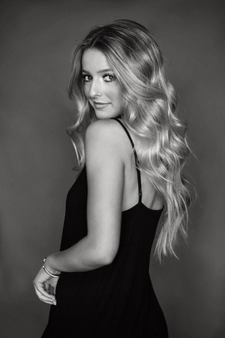 black and white photo of a woman with long hair