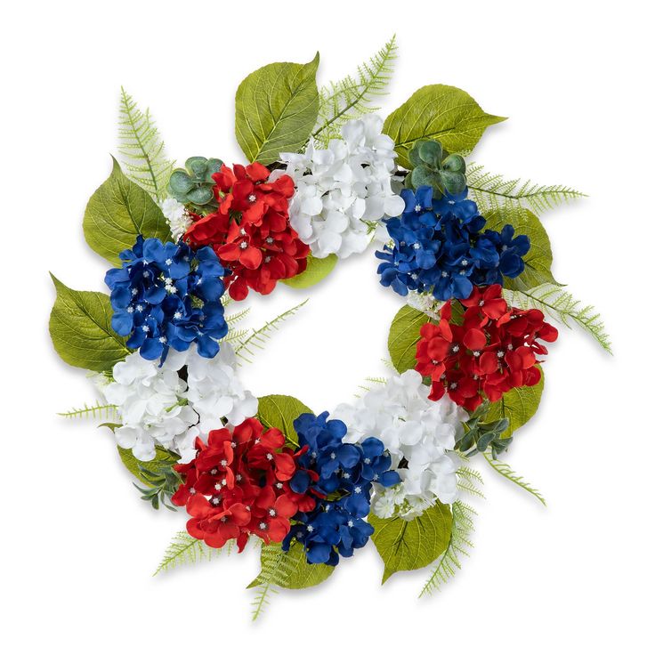 a wreath made out of red, white and blue flowers with green leaves on it